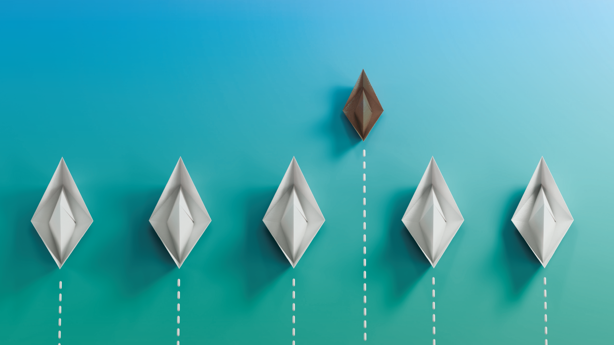 Financial Growth Strategy Paper boats arranged in a row with one boat rising above the others, symbolizing financial growth, tax planning, and business success.